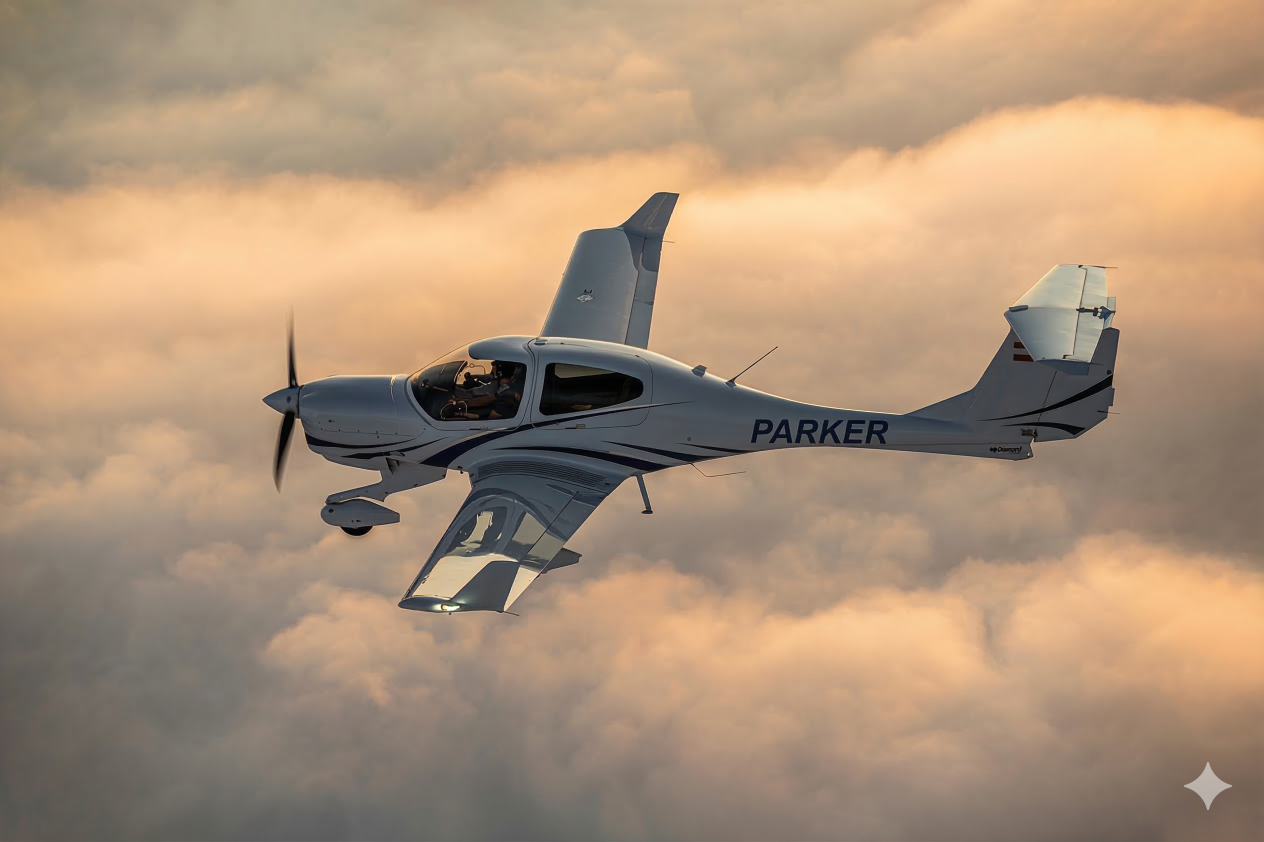 Diamond DA40NG in flight above clouds at sunset with PARKER on the fuselage